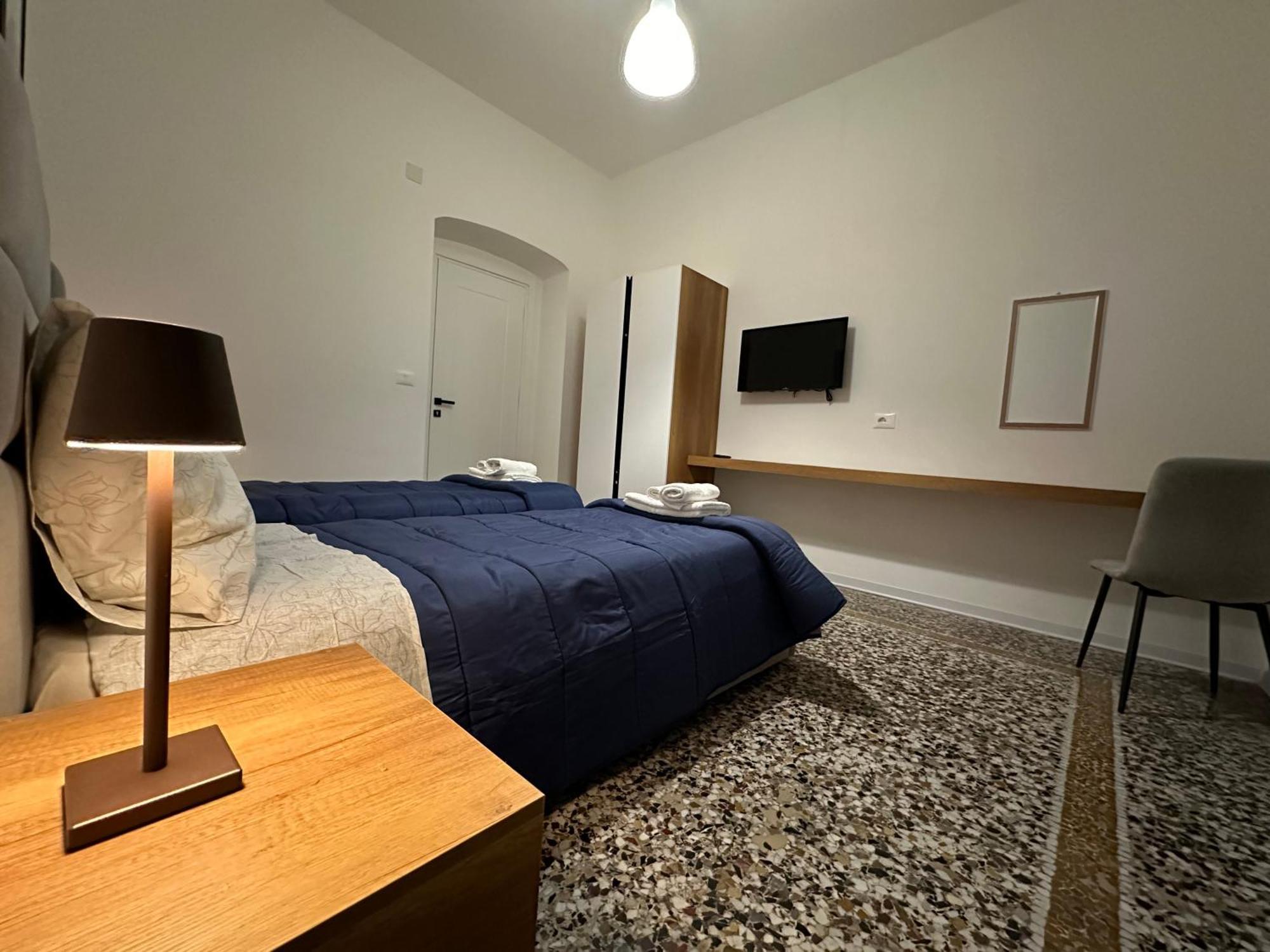 Mosaic Inn Genoa Bagian luar foto
