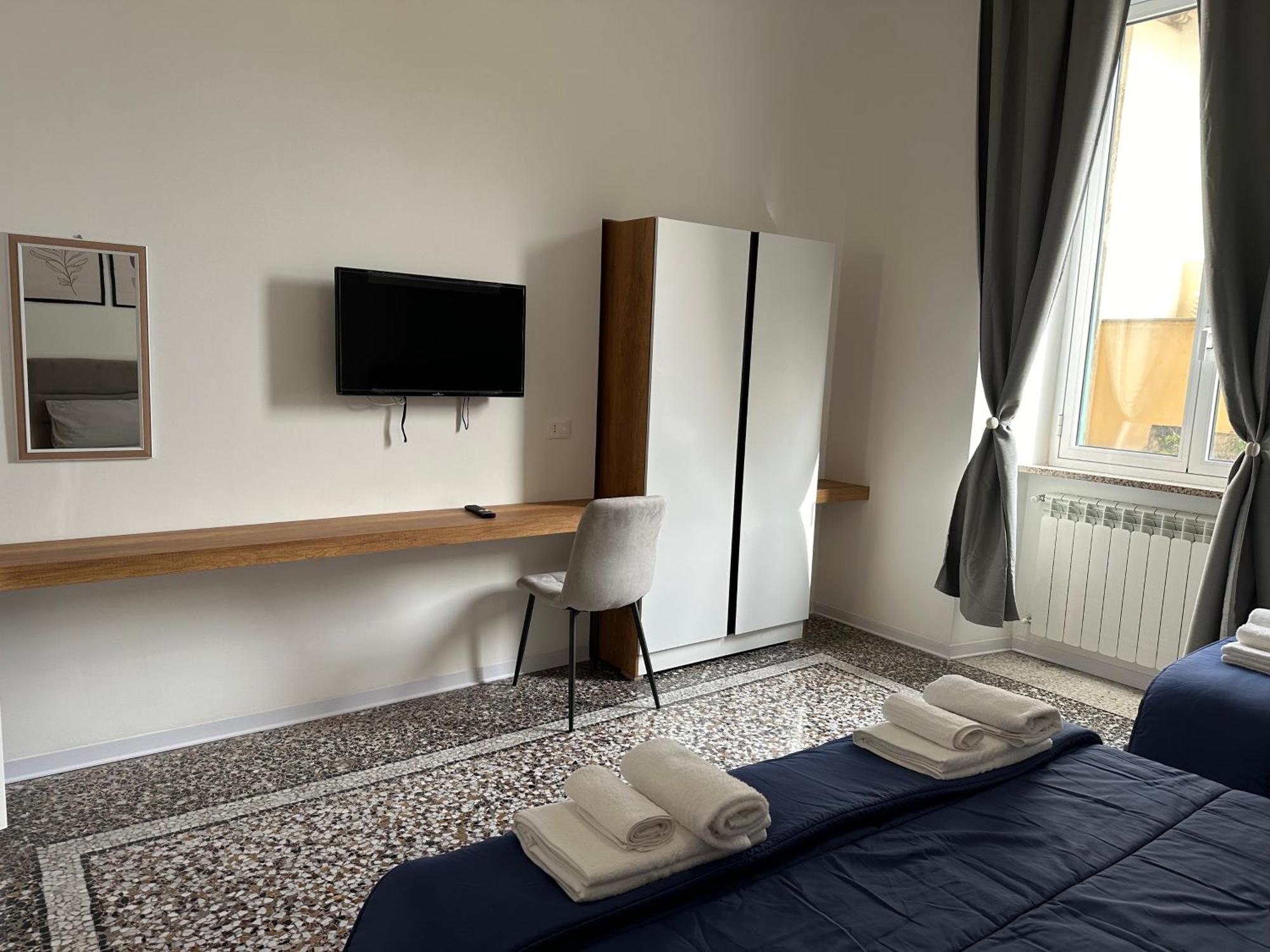 Mosaic Inn Genoa Bagian luar foto