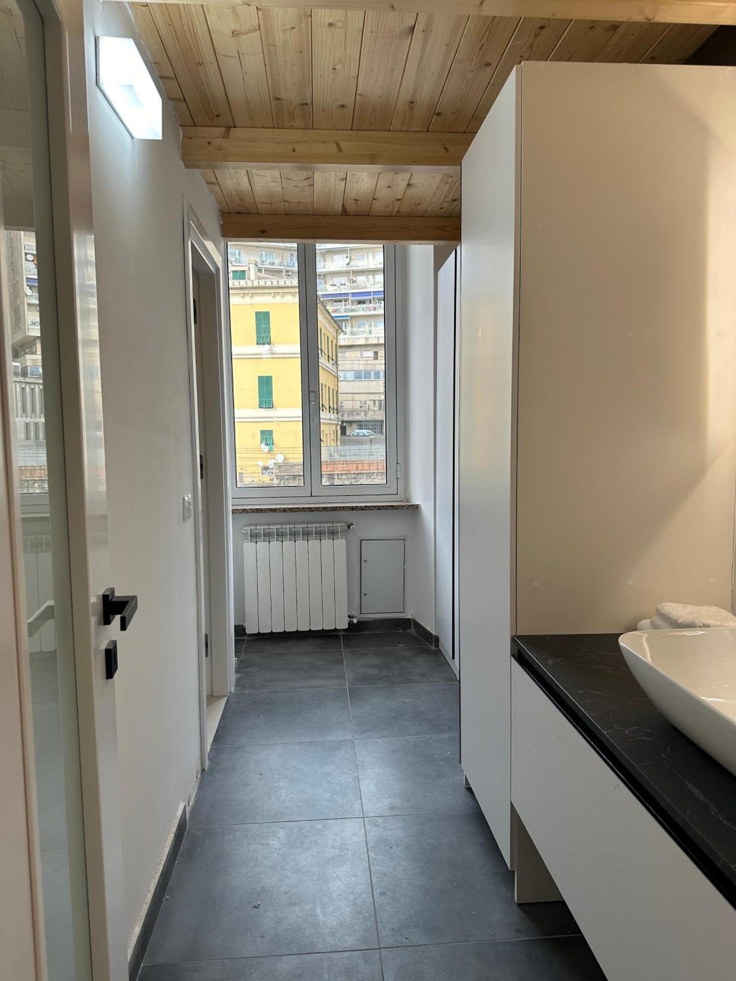 Mosaic Inn Genoa Bagian luar foto