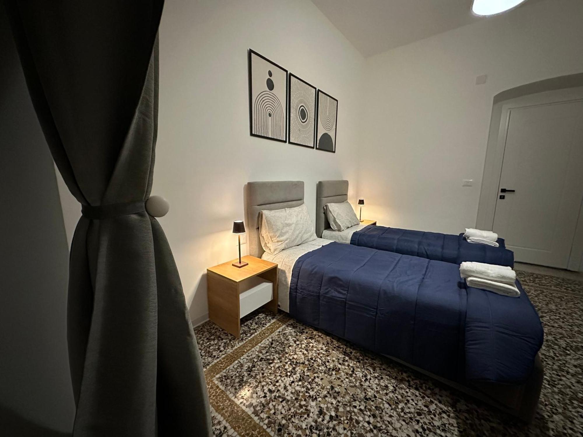 Mosaic Inn Genoa Bagian luar foto